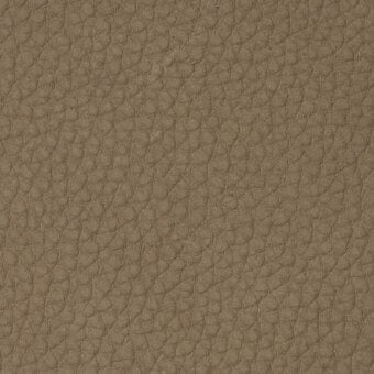 Tan nubuck leather texture displaying a dense, uniform pattern of small rounded bumps and a subtly pebbled, matte surface.